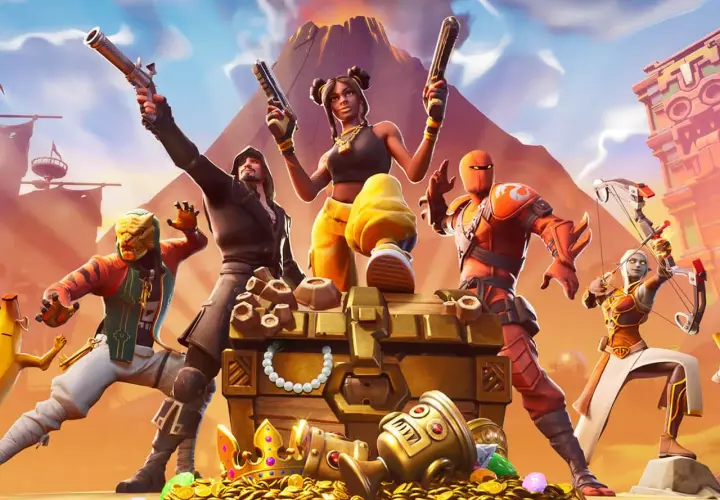 Postacie z gry Fortnite przy skrzyni pełnej skarbów. Idealne dla graczy szukających darmowe gry na PS4.