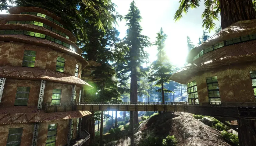 Wysokie, wielopoziomowe budowle w lesie, połączone mostem. Idealne dla graczy, którzy chcą poznać ark survival evolved wymagania.